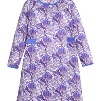 Girls/tween woven dress in blue/purple/white floral that features button closure at front neckline and blue velour detail along outside trim of dress for an elevated look.