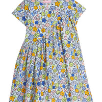 Girls/Tween knit dress in our Cartoon floral pattern which features an arrangement of cartoon flower drawings in orange/blue/pink/green printed on a light blue background. Dress also has a "swoop" detail through the front to add a ruching effect-BISBY