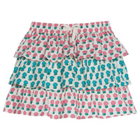 Tiered skort with built in shorts with elastic waistband and faux tie. Has pink floral pattern on bottom and top tier and a turquoise floral pattern in middle tier.