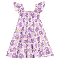 BISBY girl woven dress in a purple floral print. Dress features angel sleeves, smocking across bust, and outside surging detail for an elevated look.