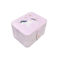 Pink fabric box with unicorn design on a light gray background