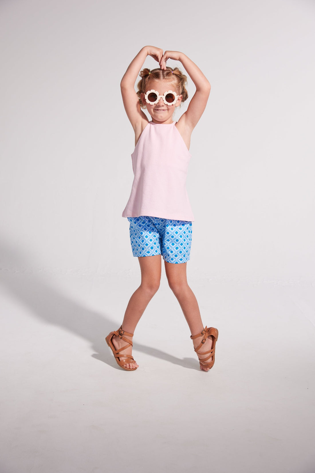 tween girls light blue shorts with dark blue geometric pattern