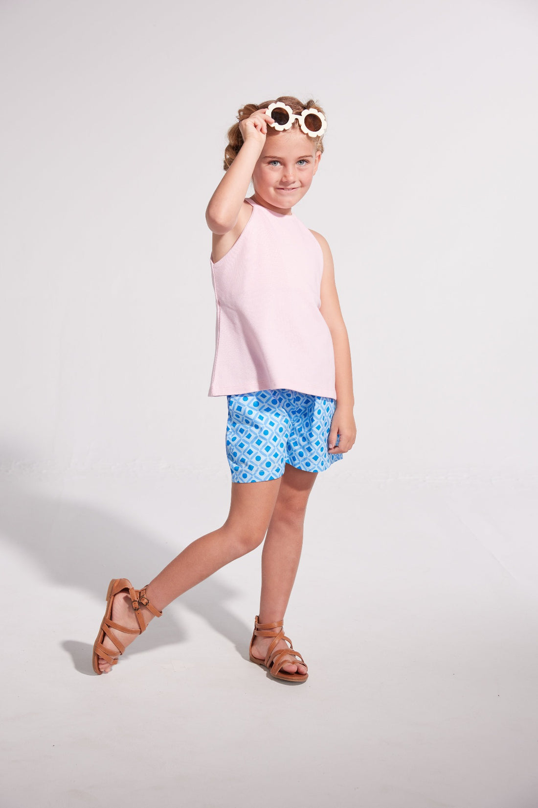 tween girls light blue shorts with dark blue geometric pattern