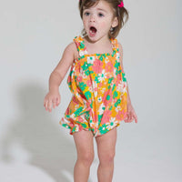 baby girl bubble with ruffled straps in orange pink and green floral pattern