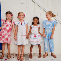 tween girls white tip with embroidered and pom pom trim neckline