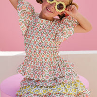 tween girls tiered mini skirt in colorblock yellow and pink floral patterns
