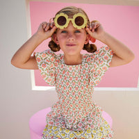 tween girls tiered mini skirt in colorblock yellow and pink floral patterns