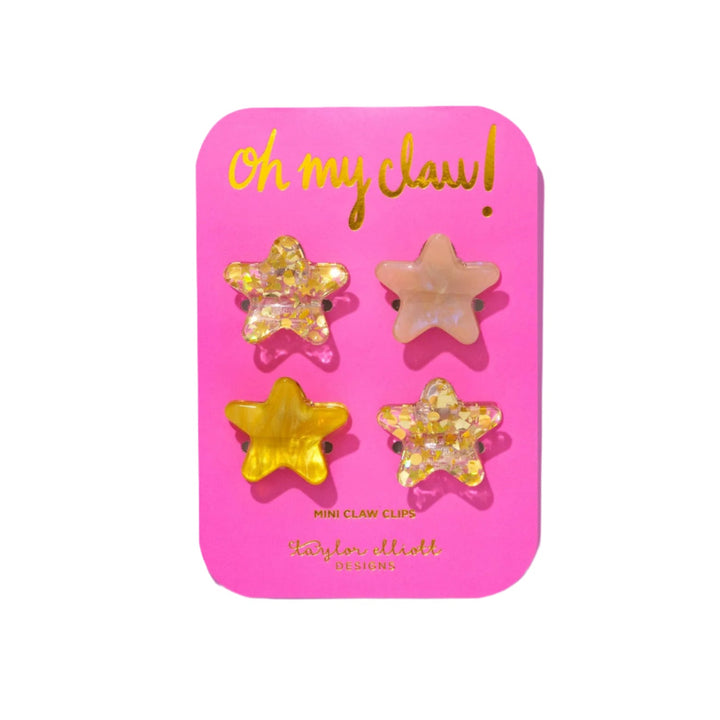 Set of star-shaped hair clips on a pink card with 'Oh my claw!' text.