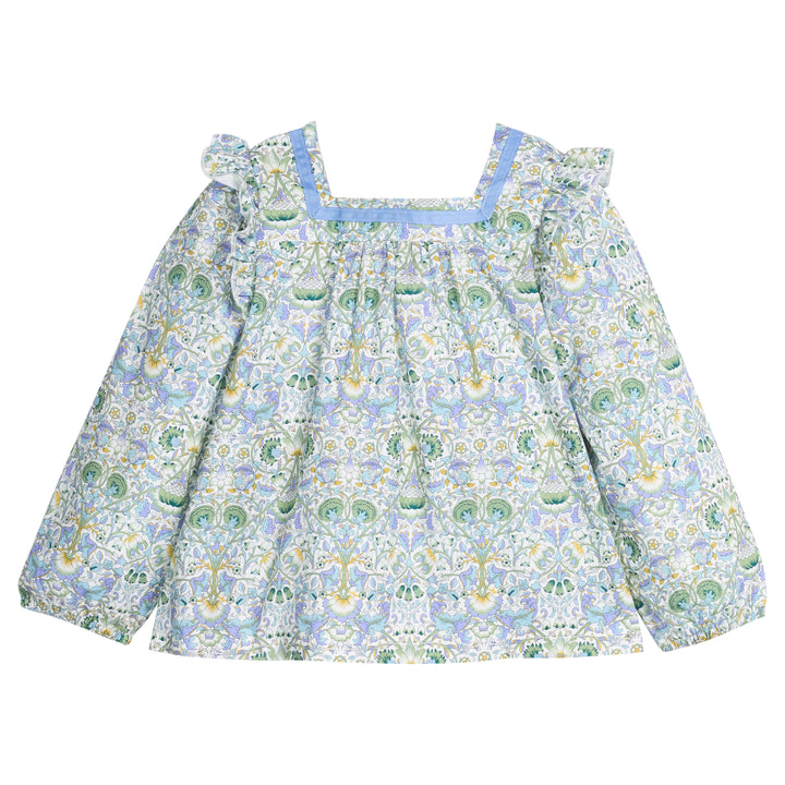 Woven long sleeve square neck top that features a light blue ribbon detail along neckline and elastic cuffs at sleeves for a relaxed but secure fit. Top is also seen to be in  a gorgeous blue/green/white floral pattern.