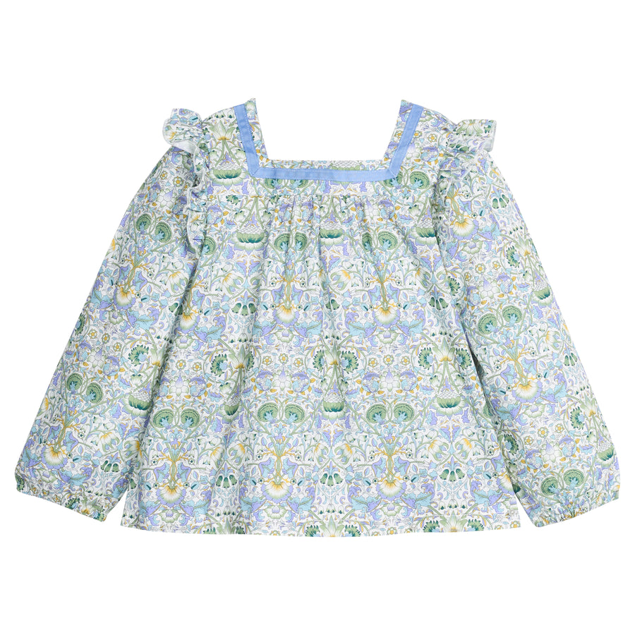 Woven long sleeve square neck top that features a light blue ribbon detail along neckline and elastic cuffs at sleeves for a relaxed but secure fit. Top is also seen to be in  a gorgeous blue/green/white floral pattern.