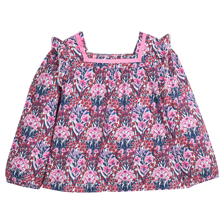 Girls pink and navy floral patterned blouse that features a ribbon detail along neckline and elastic cuffs at sleeves for a secure but relaxed fit. 