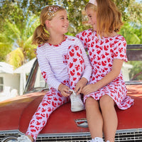valentines day outfits for girls , red and pink hearts long sleeve shirt with elbow patches and front pocket, knit heart leggings, and knit heart dress for girls