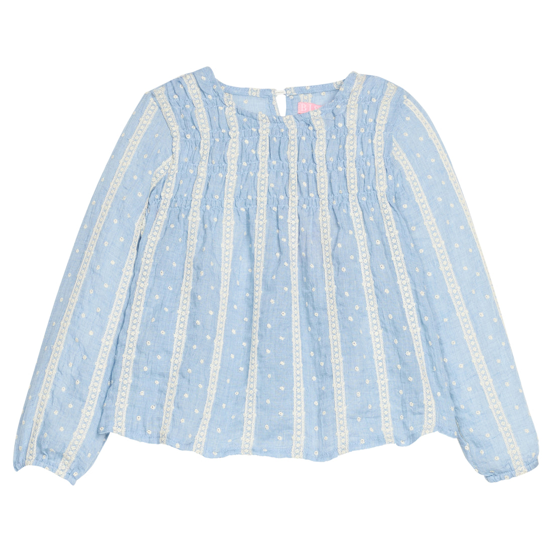 Girls light blue blouse with white embroidery dots and trim on a white background