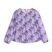Tween girls woven top that features a button closure at back of neckline, ruching across bust, and elastic cuffs at sleeves for a relaxed but secure fit. Top is also in a beautiful blue/purple/white floral print. 