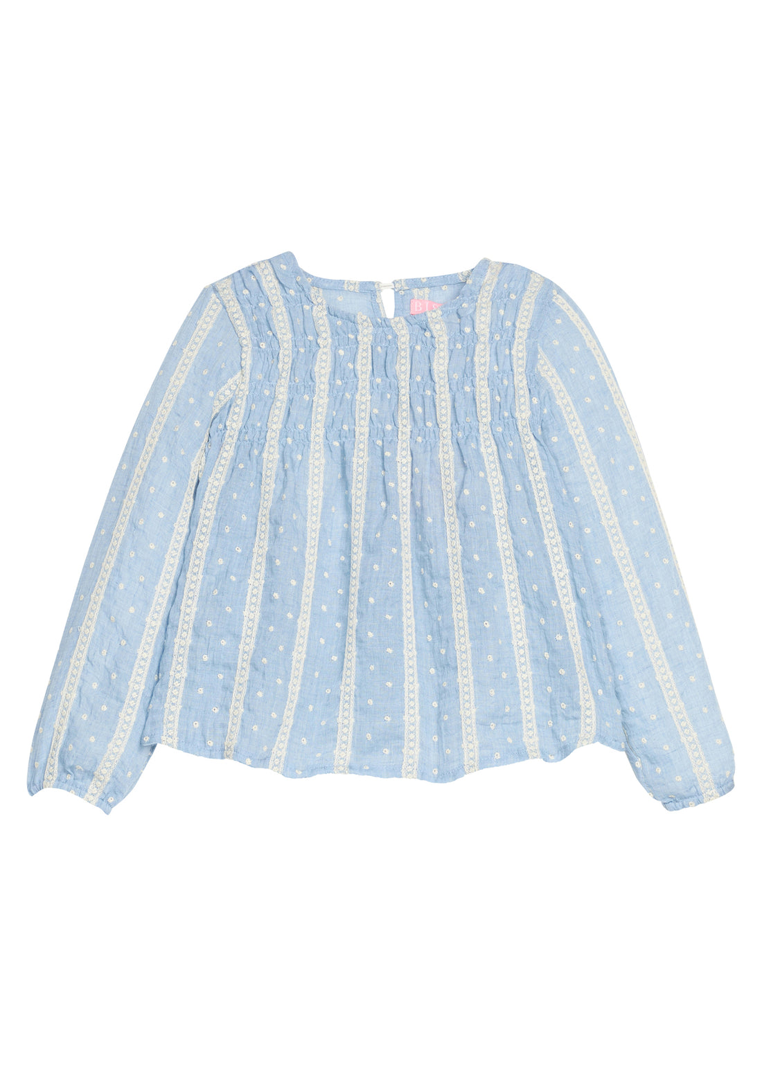 Girls light blue blouse with white embroidery dots and trim on a white background
