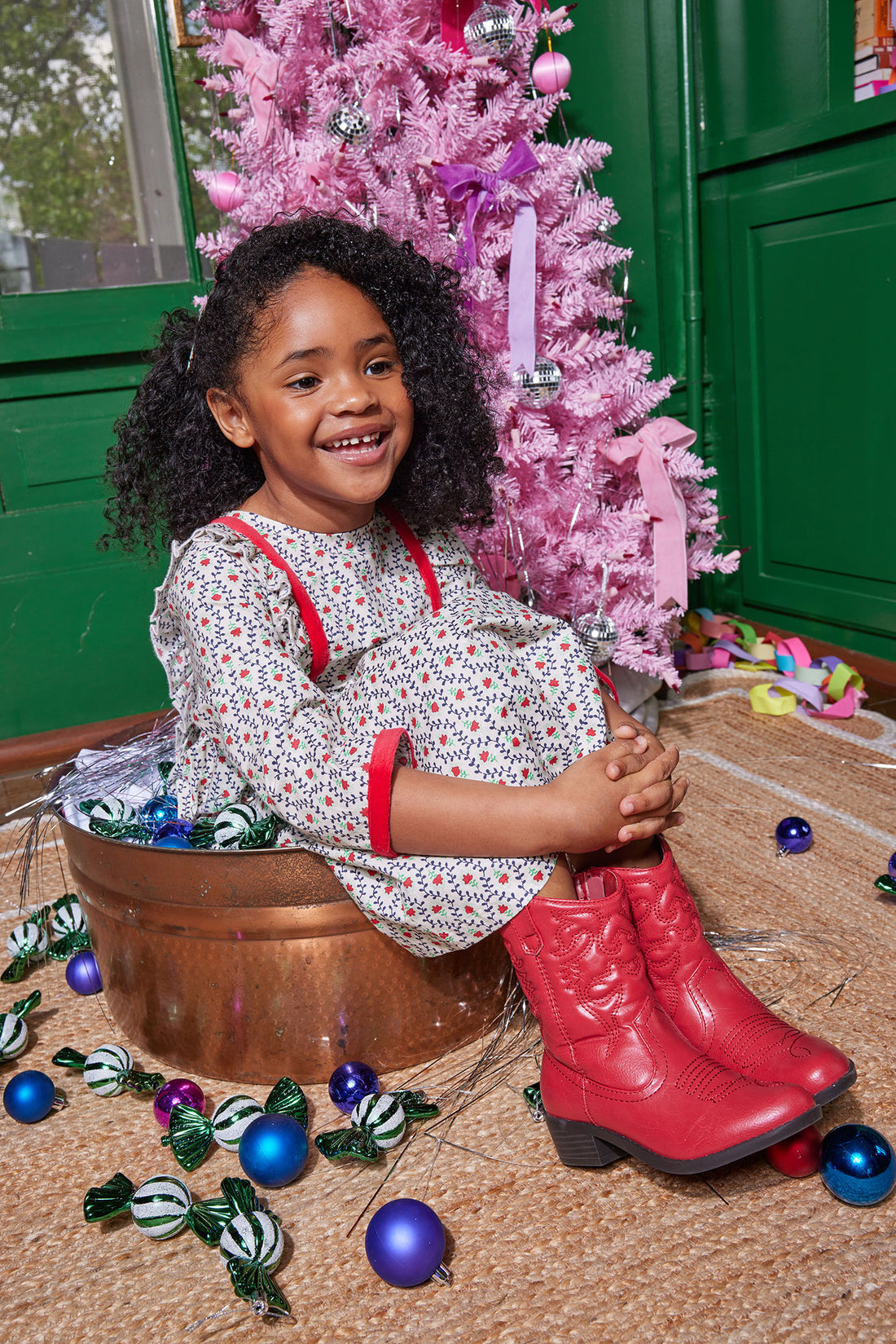 Little girl can be seen rocking our Porto Dress in our Christmas Vine floral pattern-BISBY girl 