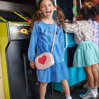 Our model can be seen wearing our Western Dress in our French Blue Corduroy--BISBY girl