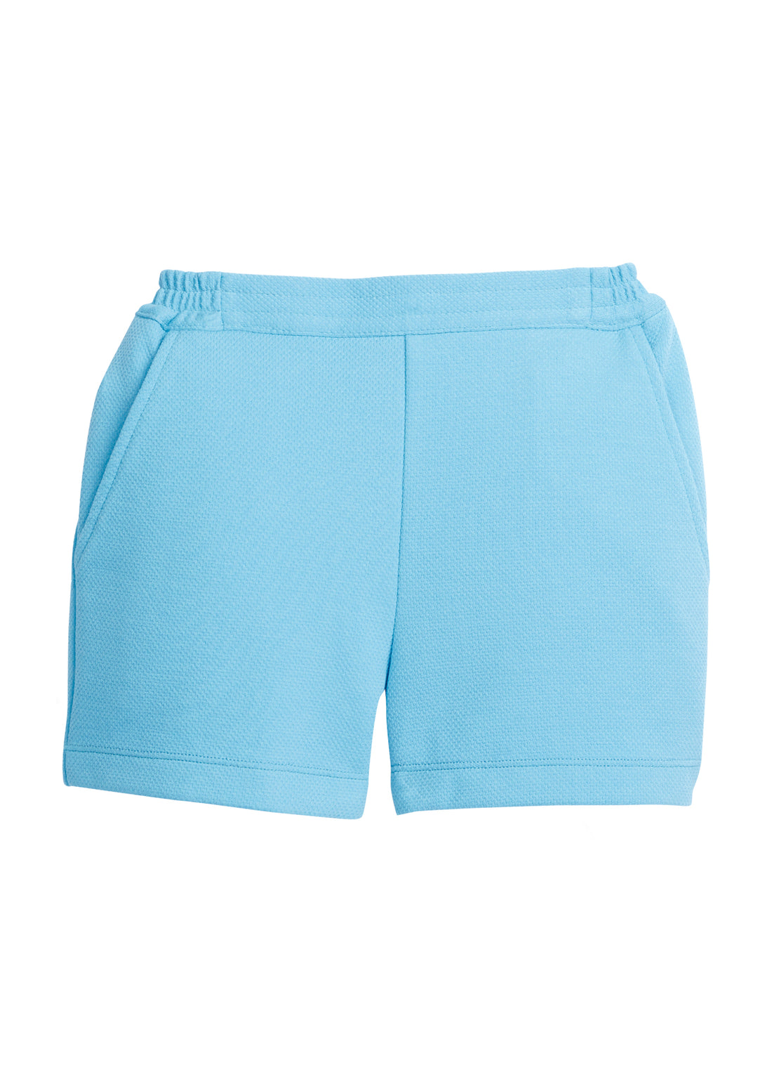 Tween girl basic shorts in our turquoise pique. These shorts have pockets and an elastic waistband making them a perfect basic for spring and summer!