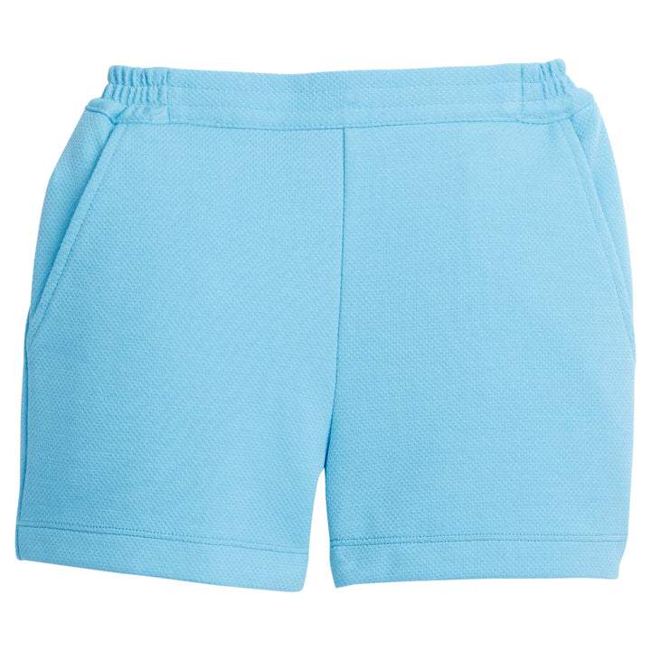 Tween girl basic shorts in our turquoise pique. These shorts have pockets and an elastic waistband making them a perfect basic for spring and summer!