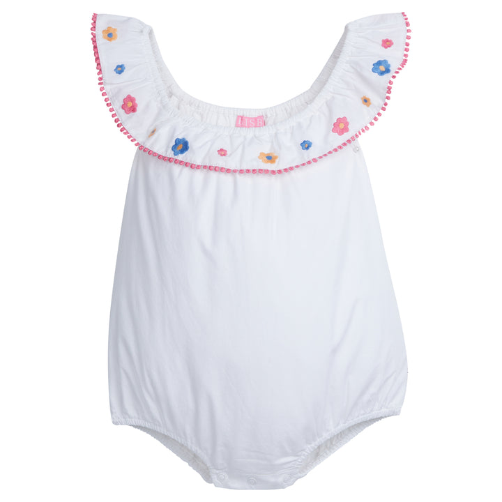 BISBY baby girl Kate bubble in out flower market embroidery. This bubble has a sweet ruffle neckline that has pink pom poms lining the edge. It also has our beautiful pink, blue, and yellow flowers embroidered along the neckline.
