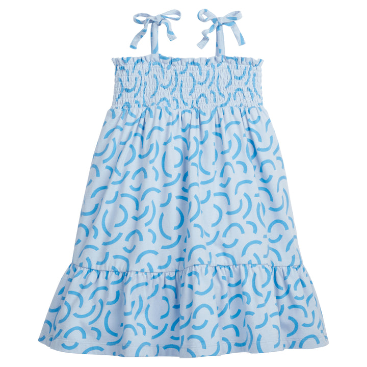 BISBY girl/tween dress featuring our Blue Ripple print. It has fixed ties on the shoulders for an elevated look and ruching along the bust for a flowy and stretchy comfortable fit!