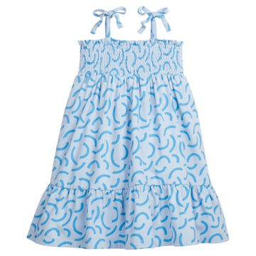 BISBY girl/tween dress featuring our Blue Ripple print. It has fixed ties on the shoulders for an elevated look and ruching along the bust for a flowy and stretchy comfortable fit!