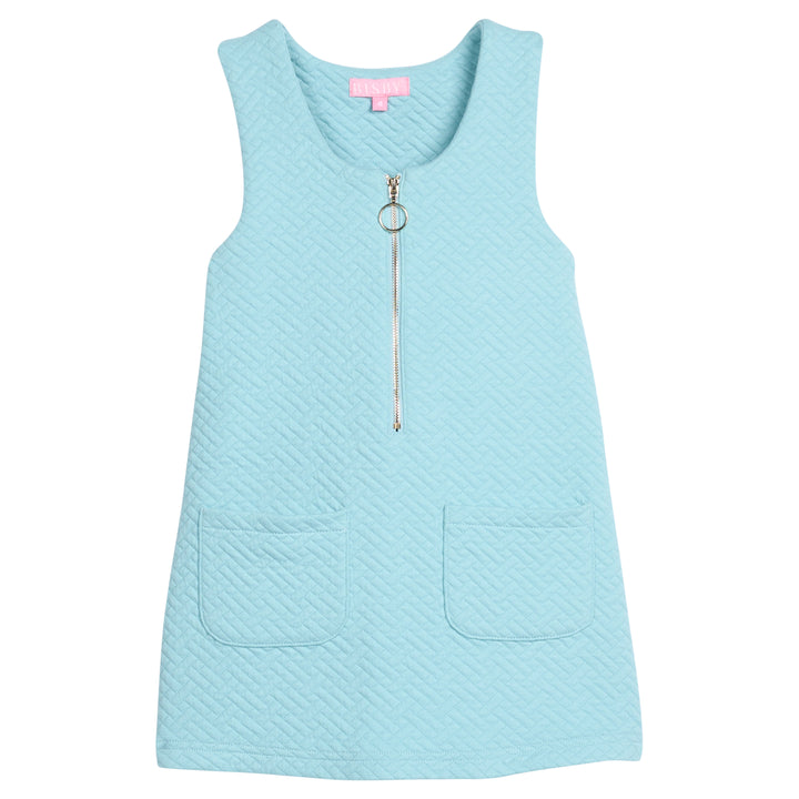 Girls/tween quilted jumper in aqua that features functional pockets in front of jumper and gold quarter zip sweater for an elevated look.