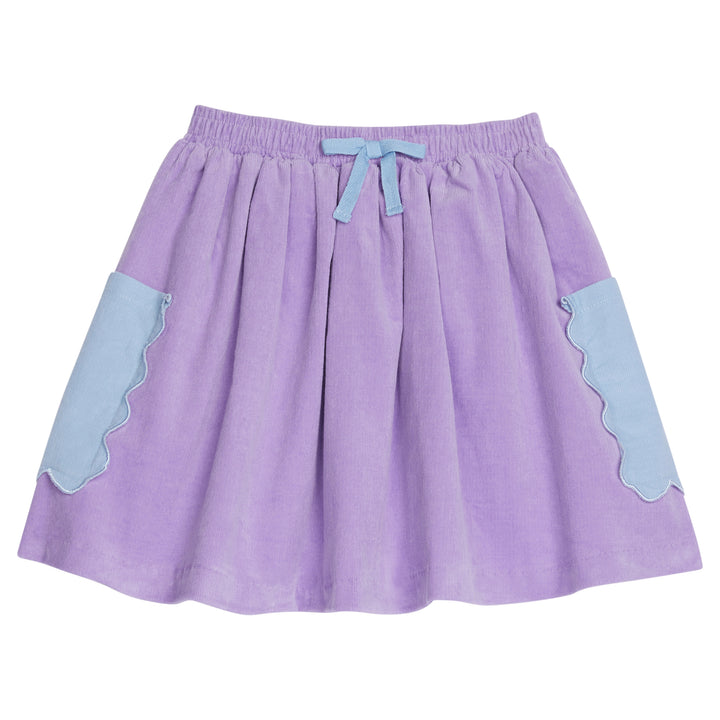 Vibrant circle skirt has a beautiful purple skirt with blue pockets and blue tie in the front--BISBY girl
