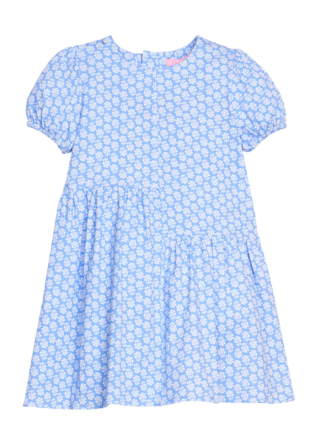BISBY girl knit dress in a white/blue floral print. Dress features an asymmetrical cut body, elastic cuffs at sleeves, and a zipper closure along back of dress. 