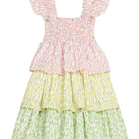 BISBY girl three tiered dress woven dress. Dress features a pink floral top tier, yellow floral print middle tier, and green floral bottom tier. Dress also features angel sleeve straps and smocking across the bust for an elevated look. 