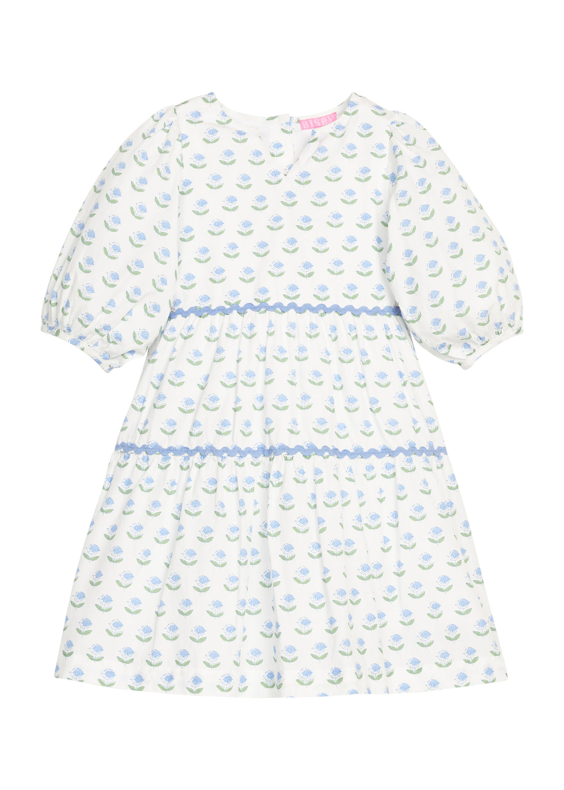 BISBY girl woven white dress in blue/green floral print. Dress features three button closure along back, elastic cuffs at sleeve, and blue ric rac detail across tiers of dress for an elevated look.