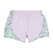 BISBY girl knit purple track shorts with woven green/aqua/purple floral print detail along sides of shorts. Shorts feature an elastic waistband as well for a secure but relaxed fit.