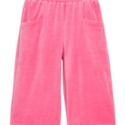 Girls pink velour palazzo pants that feature two functioning pockets in the front and an elastic waistband. 