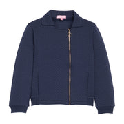 Girls/tween navy quilted jacket with a gold zipper and functional pockets.