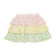 BISBY girl three tiered woven skort. Skort features pink floral print top tier, yellow floral print middle tier, and green floral print bottom tier, built in shorts, and an elastic waistband for an elevated look.