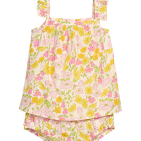 BISBY baby woven bloomer set in a pink/yellow floral print. Top features a two button at back and ruffles at sleeves. Bottom features elastic waistband and stride for easy put on/pull off access.