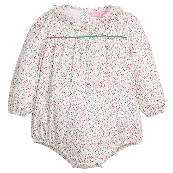 Baby girl woven bubble in a green and red floral print that features a button closure at back of neckline and at stride for easy put on/pull off access. 