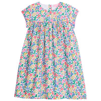 Girl dress with colorful floral print, with light pink trim across bust area and sleeves
