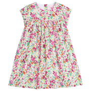 Girls dress featuring our Magenta Floral. Dress has a light pink trim that goes along the ends of the short sleeves and across the bust of the dress. Dress also has buttons along back making it easy to get in and out of-BISBY