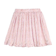 Pink crinkle skort with gold stars on a white background