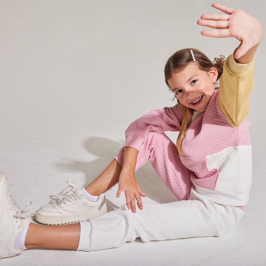 pink and white and gold color block split pants 