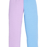 Pair of girls quilted pants in purple and blue on a white background featuring a drawstring waist.