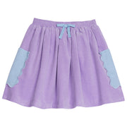 Vibrant circle skirt has a beautiful purple skirt with blue pockets and blue tie in the front--BISBY girl