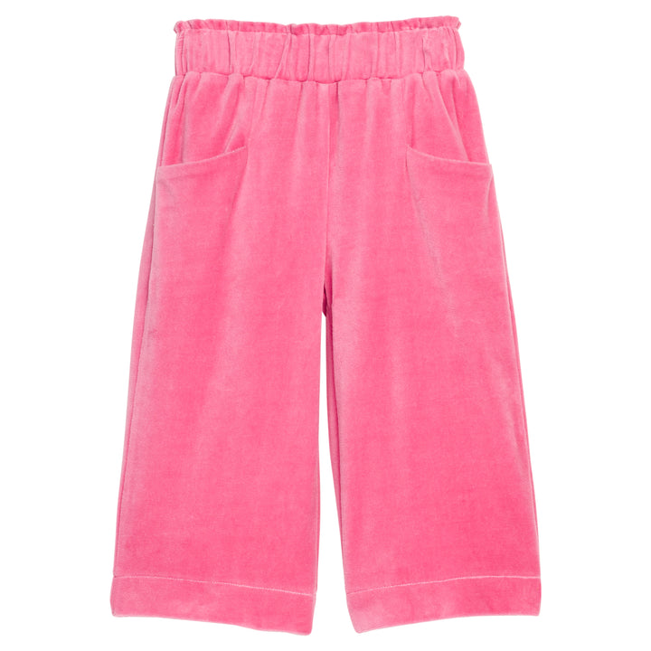 Girls pink velour palazzo pants that feature two functioning pockets in the front and an elastic waistband. 