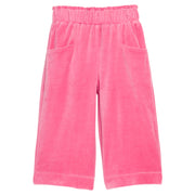Girls pink velour palazzo pants that feature two functioning pockets in the front and an elastic waistband. 