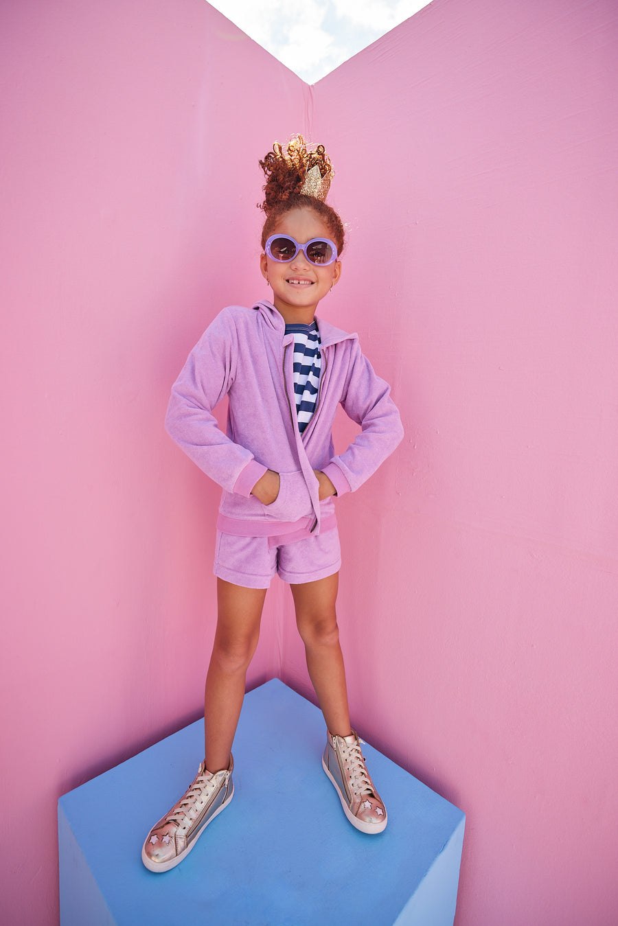 BISBY girl in our Navy/White/Metallic Stripe shirt paired underneath our Hoodie Short Set in Lilac Terry