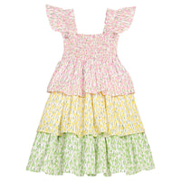 BISBY girl three tiered dress woven dress. Dress features a pink floral top tier, yellow floral print middle tier, and green floral bottom tier. Dress also features angel sleeve straps and smocking across the bust for an elevated look. 