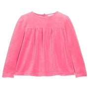 Girls pink long-sleeve velour top that features button closures at back and pleating detail at bust for an elevated look. 