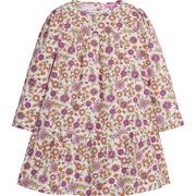 Girls/Tween woven dress in our Thistle Floral which contains an arrangement of magenta/purple/orange/and green flowers. Dress features a two-tier detail with button enclosures along the back-BISBY