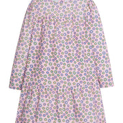 Girls/Tween woven dress in our Vienna Violets floral which contains an arrangement of purple/white/yellow flowers on a light pink background. Dress features a two-tier detail with button enclosures along the back-BISBY